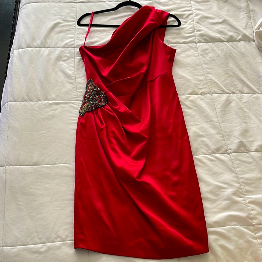 Stunning, one-strap, fitted, lined satin evening gown with embellished hip